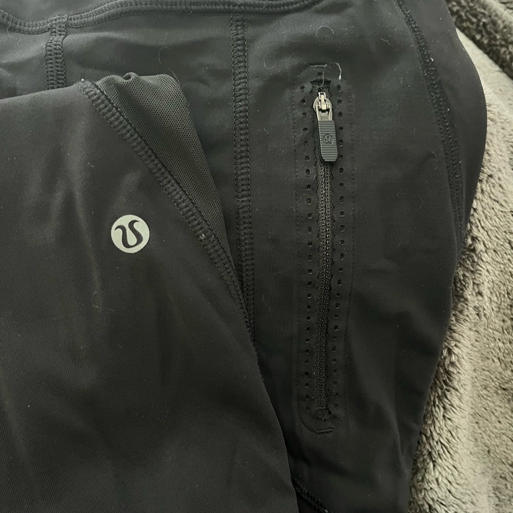 Lululemon black ruffle pocket leggings